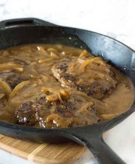 Salisbury steak in cast iron skillet. Old Fashioned Salisbury Steak Recipe, Keto Salisbury Steak, Homemade Salisbury Steak, Salisbury Steak Recipes, Beef Gravy, Steak And Mushrooms, Hamburger Steak, Onion Gravy, Inexpensive Meals