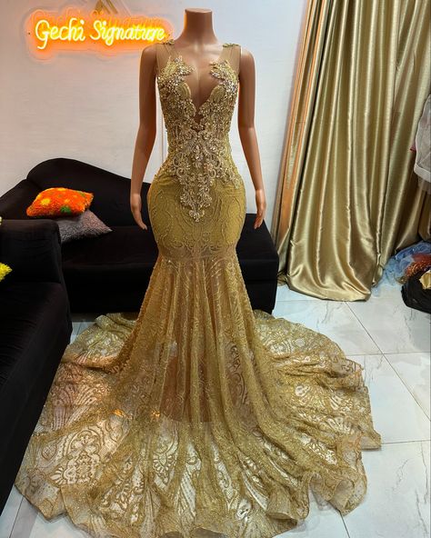 Champagne gold 🔥 #clientorder❤️ Available for pre-order in a variety of colors and sizes. Have you booked yet? #prom2025 is Open!🪡 Having trouble finding custom dresses that flatter your body? All you need to do is bring your idea/inspiration & I’ll customize that into reality. @gechisignature is here to make you look fabulous. For inquiries, send a DM or Email📨 gechisignature@gmail.com Don’t wait to book.. book and wait for us to create magic. #promdressforsale #customdesigner #prom2k25 ... Gold And White Dress Prom, Gold Custom Prom Dress, Gold Fantasy Dress, Gold Prom Dresses Black Women, Gold Wedding Dress Champagne, Champagne Mermaid Dress, Gold Rhinestone Dress, White And Gold Prom Dress, Gold Pageant Dress