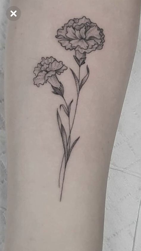 205+ Adorable Marigold Tattoos Ideas (2023) - TattoosBoyGirl Carnation Flower Tattoo Hip, Hadestown Flower Tattoo, Carnation Hip Tattoo, Carnation Flower Tattoo Arm, Simple Carnation Tattoo, Carnation Tattoo Design, Hadestown Tattoo, Marigold Tattoos, Carnation Flower Tattoo