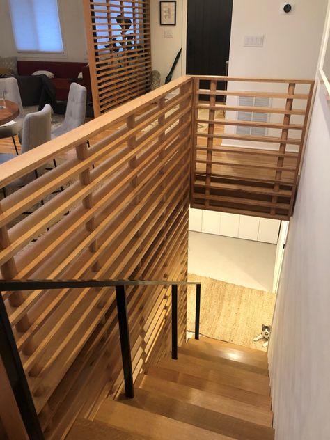 Rift-Sawn oak stairs and slat walls for a beautiful home in Barrington IL Half Wall Railing Stairs, Slat Staircase, Slat Railing, Mid Century Stairs, Loft Suite, Stairwell Ideas, Diy Stair Railing, Stairs Makeover Ideas, Slat Walls