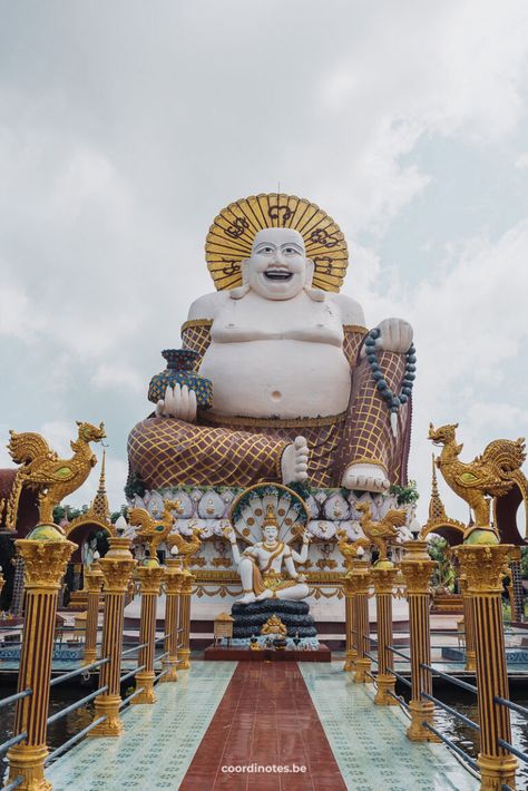 A large statue of a big man with naked upper body, a golden circle behind his head. He's wearing a squared pants and underneath is another statue of a Thai god. There's a path leading towards the statue with golden pillars on both sides. Kho Samui, Paradise Beaches, Ko Samui, Koh Samui Thailand, Samui Thailand, Tropical Beaches, Island Vibes, Koh Samui, Beach Paradise