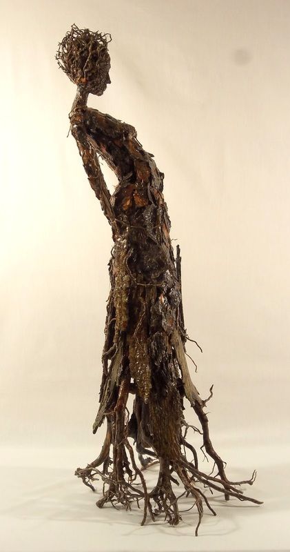 sculpture by Becky Grismer Art.  Roots is part of the series of tree bark figures that are meant to represent some of the individual characteristics shared by trees and humans. Roots represents the common characteristic of both trees and humans having roots. Pine tree roots create the figure's base, head piece and are found in the body detail. Boom Kunst, Tree Roots, Wow Art, Ancient Aliens, Tree Bark, 판타지 아트, Sculpture Installation, Figurative Sculpture, Land Art