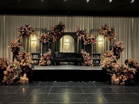 Layered floral tones and rich textures set the stage, while matching colored sand candles added the perfect finishing touch. Styling, decor, flowers and set up by @museweddingsandevents Candles by @rosewood.candles Stages Decoration Ideas, Khaleeji Wedding, Shaadi Decor, Weddings 2024, Nikah Decor, Wedding Stages, Reception Stage, Reception Stage Decor, Red Wedding Decorations