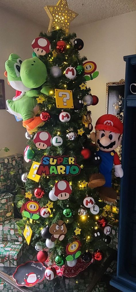 Super Mario Christmas Tree Nintendo, Diy Super Mario Christmas Ornaments, Boys Christmas Trees, Mario Themed Christmas Tree, Mario Xmas Tree, Video Game Christmas Tree, Super Mario Bros Christmas Tree, Bluey Bingo Christmas Tree, Christmas Tree Disney Theme