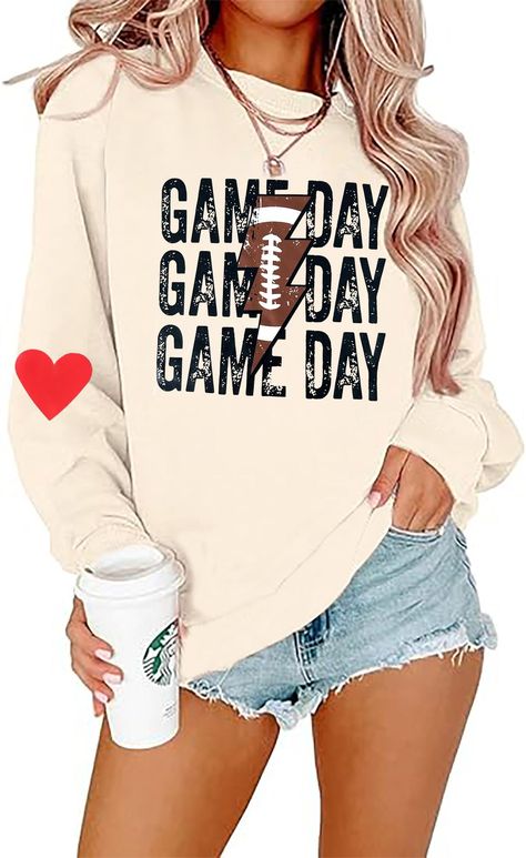 PRICES MAY VARY. Feature: Football sweatshirts for women, football gameday pullover shirt,football mom tops hoodie, game day letter print football fall outfit. Classic round neck,casual long sleeve,love heart graphic design, great fit and texture of materials. Style: Women's football game season sweatshirt, football vibes mom pullover, football players long sleeve fall tops, football lovers gift apparel, football mama pullover hoodie, perfect to wear it for football season, school,office,street, Football Mom Outfits Games, Preppy Sweaters, Football Mom Outfit, Heart Graphic Design, Mama Pullover, Mom Inspo, Casual Football, Cozy Clothes, Outfit Classic