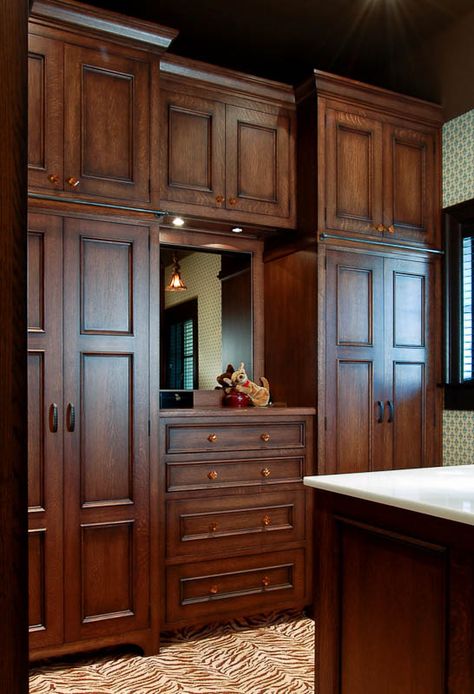 An Asheville European traditional oak closet. ARCHITECT: Keith Summerour. DESIGNER: Susan Nilson Interior Designer. Traditional Wardrobe Design, Keith Summerour, Oak Closet, Wooden Cupboard Design, Colonial Interior Design, Wooden Wardrobe Design, Wooden Closet, Colonial Interior, Wooden Cupboard