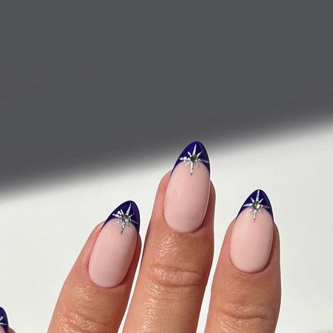 Marnie 🍒🌸🦋🌈✨ on Instagram: "Midnight blue tips centred with shimmering stars 💙✨💍  #nails #nailinspo #nailart #naildesign #winternails #autumnnails #fallnails" Midnights Nails Inspired, Navy Celestial Nails, Midnight Blue Almond Nails, Navy Tip Nails, Blue Nails With Star Design, Midnight Nails Design, Navy Holiday Nails, Midnight Rain Nails, Midnights Era Nails