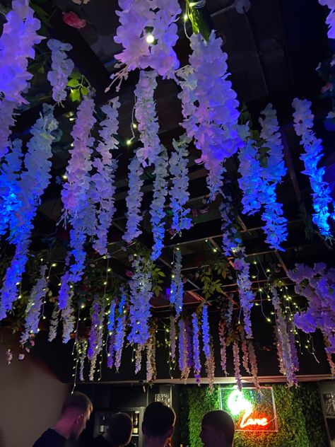 Magical Forest Prom Theme, Fairy Light Party Ideas, Flowers Dangling From Ceiling, Enchanted Homecoming Theme, Night Garden Party Decorations, Forest Fairy Party Decor, Magical Prom Theme, Enchanted Garden Birthday Party Decoration, Enchanted Garden School Dance