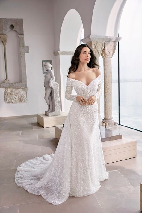 [PaidAd] 48 Most Pinned Long Sleeve Off Shoulder Wedding Dress Guides You Have To Try Now #longsleeveoffshoulderweddingdress Off The Shoulder Fit And Flare Wedding Dress, Long Sleeve Wedding Dress Fit And Flare, Ronald Joyce Wedding Dress, Fit And Flare Wedding Dress Off Shoulder, Tight Wedding Dress With Sleeves, Off The Shoulder Sheath Wedding Dress, Wedding Dress Removable Sleeves, Fitted Wedding Gown, Xmas Wedding