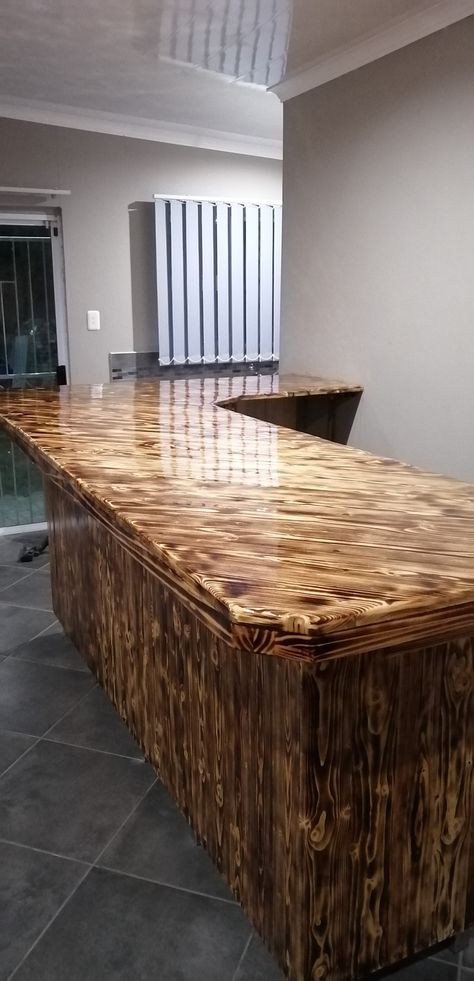 Pallet wood build into this beautiful burned wood counter with an epoxy coating Pallet Counter, Burned Wood, Pallet Bar, Wood Counter, Epoxy Coating, Bedroom Bed Design, Bar Counter, Pallet Wood, Wood Work