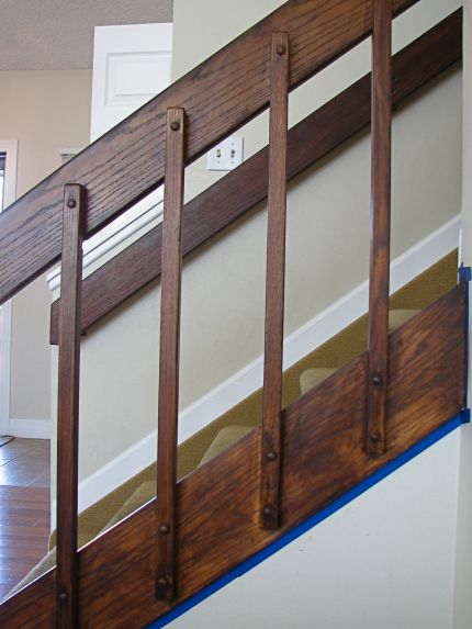 After one coat of stain Tri Level House, Banister Remodel, 80s House, Split Foyer, Foyer Staircase, Entryway Closet, Stair Rail, Brown Doors, Oak Trim