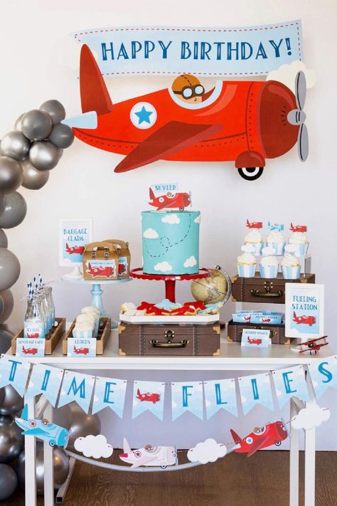 Prepare for takeoff at your airplane-themed party for a sky-high adventure! Transform your party space into an airport with airplane decorations and activities. From boarding passes to inflight entertainment, your little pilots will be flying high. With airplane snacks and turbulence-free games, maybe even a bouncy castle, this party will be soaring with excitement! Boy 2nd Birthday Party Ideas, Time Flies Birthday Party, Airplane Decorations, Airplane Birthday Theme, Airplane Party Theme, Vintage Airplane Birthday Party, Vintage Airplane Party, Vintage Airplane Birthday, Time Flies Birthday