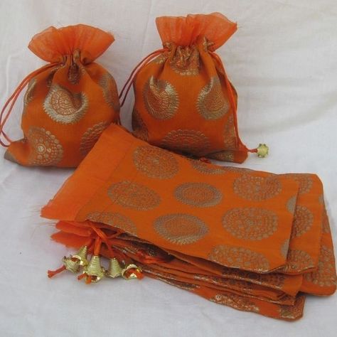 Bidh Pouches for Nikah Ceremony Enhance your Nikah ceremony with our Handmade Bidh Pouches, thoughtfully designed to add a touch of elegance and tradition to your special day. These pouches can be customized to fit your color theme and design preferences, making them a perfect addition to your wedding setup. Ideal for holding small gifts or traditional items, our Bidh Pouches offer both functionality and beauty. Features: - Customizable Design: Personalize each pouch to match your wedding t... Orange Bags, Bags Fabric, Pumpkin Patch Outfit, Children Party, Potli Bag, Wedding Gifts Packaging, Return Gift, Potli Bags, Dry Fruits