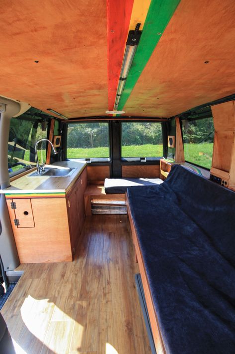 Astro van conversion! Check out our project gallery on our website for more of our converted vans. #van #vanlife #astrovan #chevyastro #vanconversion #convertedvan #kitchenette #futon #kitchen #rasta #freedomvans Chevy Astro Van Camper, Chevy Astro Van Conversion, Astro Van Camper, Astro Van Conversion, Vanlife Ideas, Mercedes Camper Van, Van Layout, Ford Transit Conversion, Cargo Van Conversion