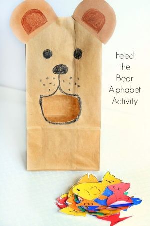 This bear alphabet activity is an excellent way to teach letter recognition and letter sounds to preschoolers. It's a great ABC activity for a bear theme! Activities With Brown Paper Bags, The Very Hungry Bear Activities, Letter B Prek Activities, B Is For Bear Preschool, Feed The Bear Game, Letter B Games For Preschool, B Letter Activities For Preschool, Bear Unit Preschool, Bear Games Preschool