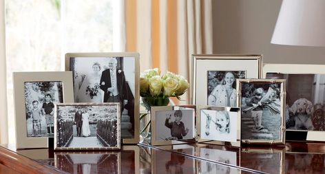 Console With Photo Frames, Table With Photo Frames, Photo Frames On Table Display, Photo Frame Display Ideas, Silver Frames On Wall, Picture Frames On Table Display, Table With Framed Photos, Photo Table Display Home, Silver Picture Frames On Table