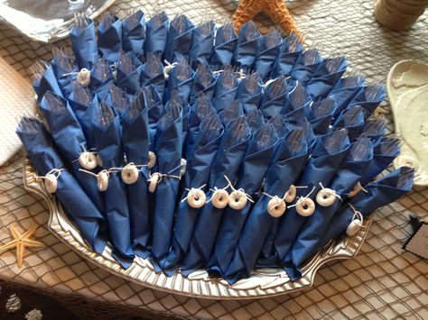 Utensils and napkins using lifesavers as buoys at nautical party Nautical Place Setting, Nautical Engagement Party, Boat Party Theme, Cruise Theme Parties, Beach Engagement Party, Nautical Baby Shower Decorations, Navy Bridal Shower, Blue And Blush Wedding, Nautical Bridal Showers