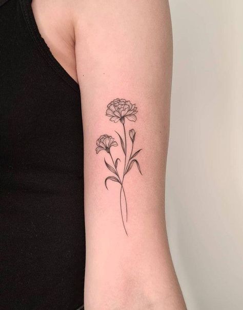 180+ Beautiful Birth Flower Tattoo Ideas (2023) - TattoosBoyGirl Carnation Tattoos, Lit Tattoos, Tattoo Between Breast, Birth Flower Tattoo Ideas, Marigold Tattoo, Mum Tattoo, Carnation Tattoo, Flower Tattoo Ideas, Bouquet Tattoo