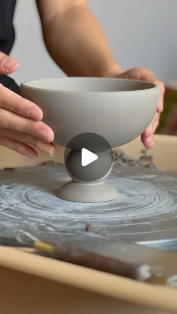 Issey 崔 Roquet on Instagram: "Very tricky trimming but oh so satisfying once sculpted. I get a lot more casualties when working with this shape than a typical mug/bowl shape. There’s a lot of steps that can go wrong where the piece can lose balance.   You might wonder why I choose to throw this in one piece and then carve my way through, instead of piecing three pieces together. Maybe I’m sadistic (lol) but mainly I think that attaching separate pieces runs the risk of breaking in the firing. And achieving a spherical shape in the middle that’s nicely centred is also preferably done by trimming. All in all, excited to play with making more of these 😊 I do enjoy a good challenge.  Check out the two previous videos to see how I throw & carve the inside of the foot ✌🏼  #satisfying #pottery Pottery Forms Shape, Trimming Pottery Bowls, Pottery Feet Ideas, How To Pottery, Ceramic Bowl Shapes, Throwing Inspiration, Advanced Pottery, Pottery Wine Cups, Altered Pottery