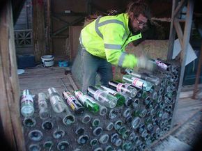 how to put glass bottles in cob walls - a great starter piece to learn how to in the backyard this or a cob wall Cob Building, Cord Wood, Bottle House, Earthship Home, Natural Homes, Bottle Wall, Cob House, Earth Homes, Natural Building