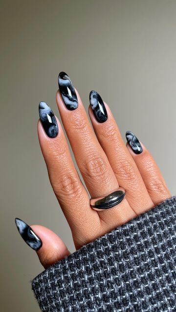 San Sung Kim | 김산성 on Instagram: "𝒪𝓃𝓎𝓍 🌬️🖤
...
Can you believe this was achieved by using just two colors? Gahhhh the obsession is real with designs that need so little to make a huge impact.
—
Products Used:
•@gelcare.official Patent Leather Black*
•DVOK MarbleFit Cloud & Base from @sweetienailsupply 
*aff code: SANSUNG
(10% off Sweetie)
(15% off Gelcare)

#blackmarble #marblenails #fallnails #autumnnails #blacknails #halloweennails #spookynails" The Obsession, Studded Nails, Marble Nails, Rhinestone Nails, 3d Nails, Black Marble, Black Nails, Halloween Nails, Patent Leather