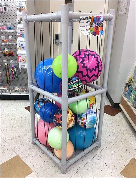 Balls Storage Ideas, Ball Organizer Diy, Outside Ball Storage, Ball Stand Diy, Diy Ball Holder Storage, Swiss Ball Storage, Outdoor Ball Storage Diy, Outdoor Ball Storage, Ball Storage Garage