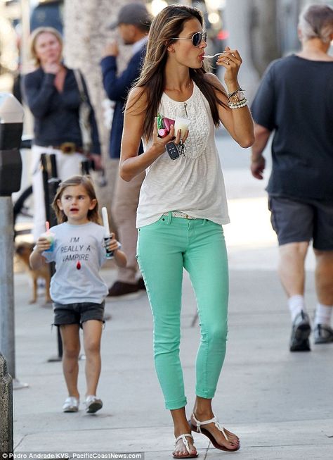 Alessandra Ambrosio shows off her figure in bright skinny jeans as she tucks into non-fat treat | Mail Online Outfits Pantalon Verde, Alexandra Ambrosio, Alessandra Ambrosio Style, Verde Aqua, Coloured Jeans, Mint Jeans, Color Pants, Jeans Casual, Alessandra Ambrosio