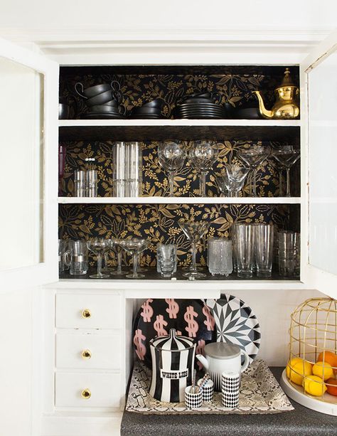 Wallpaper For Inside Kitchen Cabinets, Painted Inside Kitchen Cabinets, Wallpaper Glass Cabinet, Cabinet With Wallpaper Inside, Wallpaper Cabinet Interior, Wallpaper Inside Kitchen Cabinets, Wallpaper In Kitchen Cabinets, Built Ins With Wallpaper Backing, Bookshelves With Wallpaper Backing