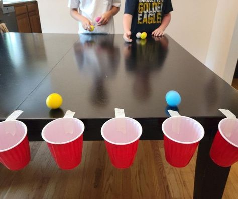 Christmas Team Games For Kids, Christmas Toss Game, Easy Nye Games For Kids, Red Solo Cup Party Games, Cup Pong Christmas Game, Minute To Win It Cup Stacking, Christmas Games For Family With Ping Pong Balls, Minute To Win It Games With Ping Pong Balls, Ping Pong Party Games