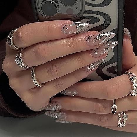 Amazon.com: MISUD Press on Nails Medium Almond Fake Nails Glossy Glue on Nails Chrome Swirl Acrylic Nails Stiletto Silver Aurora Artificial Nails 3D Pearl Flash False Nails with Design 24 pcs : Beauty & Personal Care Cyberpunk Nails, Nails Medium Almond, Acrylic Nails Stiletto, Sophisticated Nails, Estilo Cyberpunk, Nails With Design, Usa Nails, Chrome Nails Designs, Nails Glossy