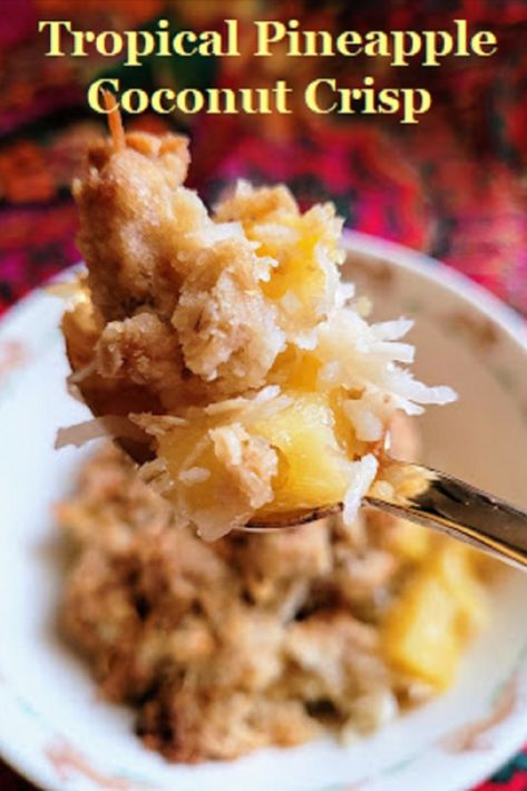 a heaping spoonful of crisp with chunks of pineapple and toasted coconut Pineapple Crisp Recipe, Tropical Bread, Pineapple Oatmeal, Fruit Dumplings, Pineapple Crisp, Pineapple Cobbler, Pineapple Cheese, Banana Zucchini Muffins, Cooked Pineapple