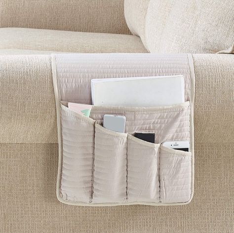 PRICES MAY VARY. 100% Polyester ORGANIZER WITH UNIQUE DESIGN: Light beige on both sides, with channel quilting, elegant, timeless and unique. Keep your accessories organized and protect your couch armrest against mess. Pets friendly. Made to enhance any decor. DURABLE AND COMFORTABLE: Premium quality of microfiber and extra soft fill, quilted with half inch delicate channel patterns, made to last. PERFECT FIT: Fit most sofa, couch, recliner, chair armrest. 5 pockets caddy designed for TV remote Remote Organization, Bedside Caddy, Sofa Armrest, Remote Control Holder, Sofa Beige, Pocket Storage, Premium Sofa, Tv Remote Controls, Beige Sofa