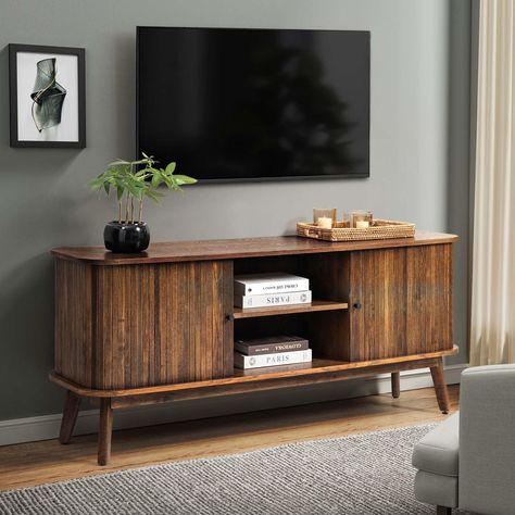 PRICES MAY VARY. [Farmhouse Style TV stand] This media console cabinet can be used as a TV stand to support flat screen TVs up to 65", suitable for most home TV placement. If you like, it can also serve as a storage cabinet to show your family photos and potted plants. [Sliding Barn Doors] Two movable barn doors on the TV stand for convenient access to cabinets. Quality steel bars make doors slide smoothly, and no noise during movement. Two sliding barn doors are designed to conceal side storage Sliding Door Tv Stand, Farmhouse Style Tv Stand, Living Room Walnut, Home Mid Century Modern, Rustic Entertainment Center, Mid Century Modern Tv, Bedroom Tv Stand, Home Mid Century, Mid Century Modern Tv Stand