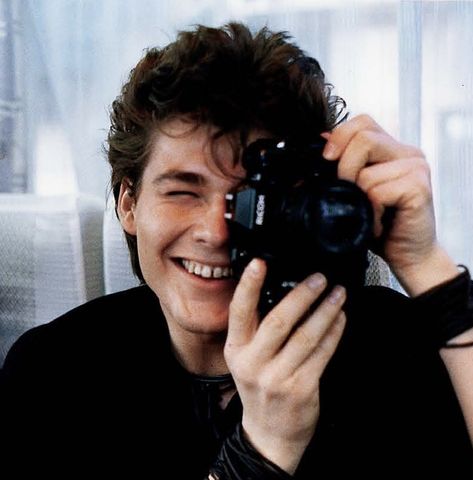 Morten Harket taking a photograph with his camera in 1986. Morten Harket 80s, Morton Harket, Norwegian People, Aha Band, Roland Orzabal, 80s Synth, Morten Harket, 80s Men, Pop Rock Bands