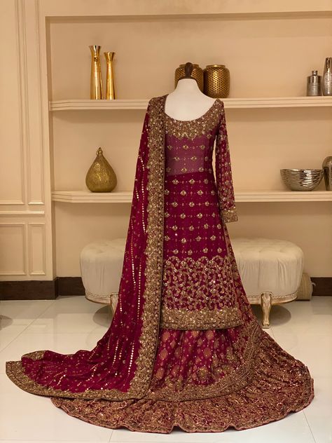 Includes: Shirt Sharara Dupatta Fabric: Silk net Color: Red Work Technique: Mastered Tailoring Description: It is a stitched three-piece outfit. Disclaimer: The color of the outfit may vary due to photographic lighting sources. Indian Reception Dress, Wedding Gharara, Custom Bridal Dress, Maroon Lehenga, Bridal Things, Pakistani Culture, Pakistani Bridal Dress, Reception Dresses, Walima Dress