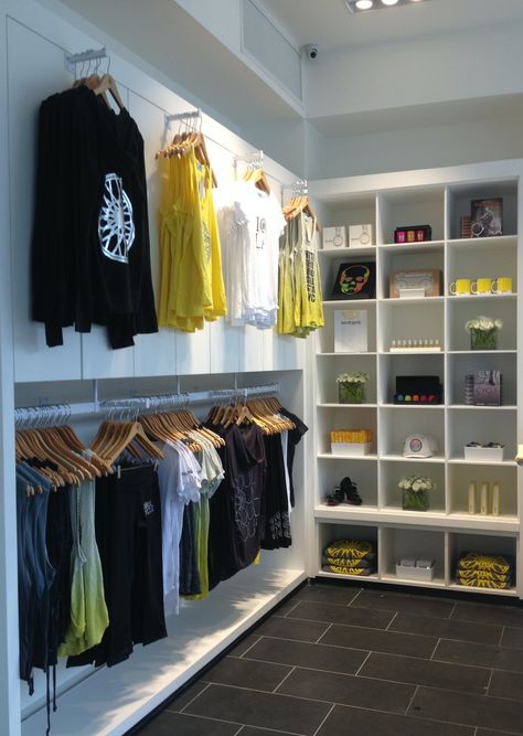 Retail Decorating Ideas, Gym Merchandise Display, Apparel Display, Yoga Studio Ideas, Merchandise Display, Spin Studio, Dance Store, Clothing Store Displays, Clothing Display