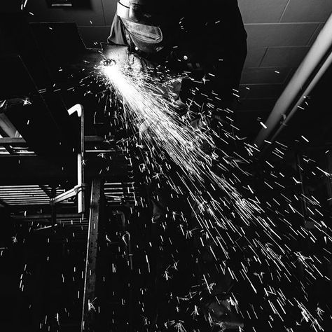 My parents met at #roymfg in the 80’s and I worked there a little bit in high school, and then kind of started a manufacturing engineering career by accident the 6 years following high school and working for Cold Stone Creamery. It’s not something I necessarily liked doing, but I got pretty decent at it. I have a super soft spot for trade work, specifically the metal industry and American manufacturing, and I really owe my entire life to it. So seeing images of fabrication and manufacturing alwa Welder Aesthetic, Welding Aesthetic, Mechanics Aesthetic, Tools Photography, Women Welder, Factory Photography, Underwater Welder, Shielded Metal Arc Welding, Tools Aesthetic
