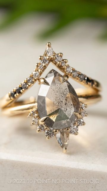 POINT NO POINT STUDIO on Instagram: "Another Engagement ring inspo of the day! ✨ If you’re unsure on what to get your partner, you can never go wrong with a salt and pepper pear diamond in our Ava setting! 💍 A classic pear with striking half halo of accent diamonds to give you that extra sparkle 💎✨ . . . . . . . . Diamond, pear diamond, alternative engagement ring, engagement ring, unique rings, unique jewelry, bride, ring goals, Pinterest inspired, wedding rings, one of a kind, salt and pepper diamond, black diamond, fine jewelry" Salt And Pepper Ring Engagement, Engagement Rings Salt And Pepper Diamond, Ring Goals, Salt And Pepper Engagement Ring, Bride Ring, Diamond Alternative Engagement Ring, Jewelry Bride, Salt And Pepper Diamond Ring, Bold Statement Necklaces