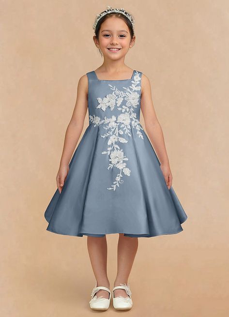 Kata is an elegant and sophisticated matte satin flower girl to wear. Her square neckline bodice is adorned with delicate hand sewn lace embellishments that cascade onto the box pleat full A-line skirt; that creates a voluminous and graceful silhouette. Blue Floral Flower Girl Dress, Dusty Blue Flower Girl, Satin Flower Girl Dresses, Blue Flower Girl Dress, Blue Flower Girl, Lace Embellishments, Flower Girl Dresses Blue, Wedding Blue, Dress Dusty