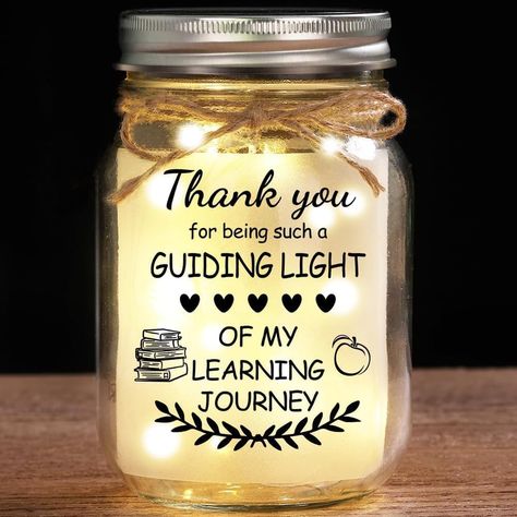 PRICES MAY VARY. Unique Gift for Teacher: Illuminate Teacher's special occasions with our 16oz Lighted Mason Jar. This beautiful and decorative gift is perfect gift to express your love to your teacher as a warm gifts for birthday, Christmas, Teacher's day, Valentine's day, Easter, Thanksgiving Day, anniversary or just a daily surprise gift Teacher Appreciation Gifts: Express your love with the warm message on this teacher gift: THANK YOU FOR BEING SUCH A GUIDING LIGHT OF MY LEARNING JOURNEY, i’ Cute Thank You Gifts For Teachers, Para Gifts Appreciation, Teacher Gift From Student Teacher, Homemade Appreciation Gifts, Cute Gift Ideas For Teachers, Teacher Christmas Gift Ideas Cricut, Teacher Supply Gift Basket, Teacher Farewell Gift, World Teachers Day Gifts