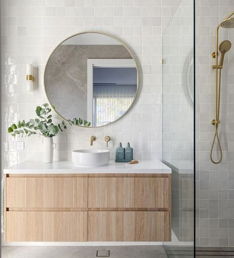 INTERIOR DESIGN | STYLING & DECORATING on Instagram: "✨Introducing the guest en-suite at our Somerton Park Project ✨

We wanted to create a space that was both understated and yet had a subtle wow factor. Our goal was to design a guest bathroom that would feel welcoming and luxurious, but also timeless. I think we nailed it 😉

To achieve this, we focused on selecting classic finishes and fixtures that would stand the test of time. We chose a neutral color palette of warm grays and whites, which creates a calming and peaceful atmosphere. 

The feature tile is the Zellige Ceramic Gesso and the floor tile is Anzo Moon Matt both from @ceramicatiledesign 🙌🏼

The custom-built vanity features clean lines and a timeless design. We paired it with a stunning marble countertop, one feature wall li Feature Wall Ideas Bathroom, Bathroom Feature Tile, Bathroom Feature Wall Ideas, Bathroom Neutral Colors, Neutral Bathroom Ideas, Bathroom Feature Wall Tile, White Marble Tile Bathroom, Bathroom Furniture Ideas, Modern Bathroom Furniture