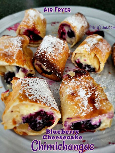 Air Fryer Blueberry Fritters, Air Fryer Strawberry Cheesecake Chimichangas, Cheesecake Tortilla Roll Ups, Air Fryer Nibbles, Blueberry Cream Cheese Tortilla, Air Fried Chimichangas, Airfryer Fruit Recipes, Ninja Air Fryer Baking Recipes, Air Fried Fruit