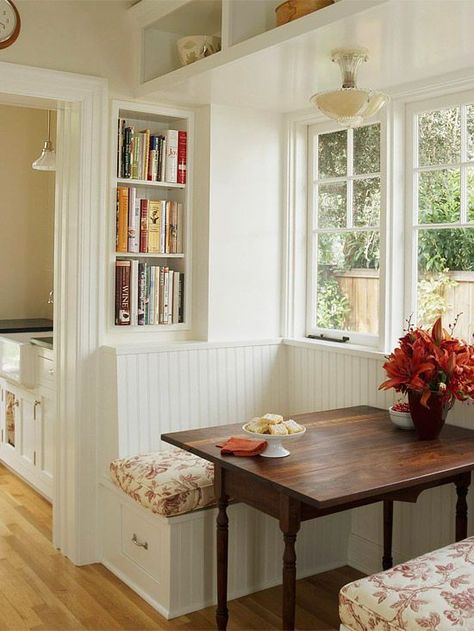 This banquette is packed with useful storage! Find more looks here: http://www.bhg.com/kitchen/eat-in-kitchen/breakfast-nook-ideas/?socsrc=bhgpin082814superstorage&page=15 Window Seat Kitchen, Kitchen Banquette, Cozy Breakfast Nook, Casa Country, Kitchen Nook, Cozy Kitchen, Pool Design, Dining Nook, Room Decorations