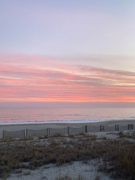 Photo taken at Holden Beach NC at sunset, such pretty pink and slight purple clouds on the horizon Beach Pink Aesthetic, Pink Beach Aesthetic, Aubreigh Wyatt, Pretty Skys, Colourful Collage, Holden Beach Nc, Beach 2024, Collage Posters, Pretty Sunsets