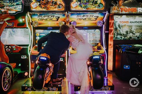 Arcade Couples Photoshoot, Arcade Wedding Photos, Carnival Engagement Photos, Arcade Engagement Photos, Arcade Couple, Flutter Sleeve Wedding Dress, Arcade Shoot, Arcade Wedding, Pre Shoot