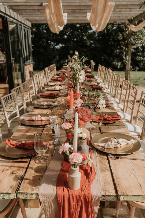 Burnt orange rustic outdoor wedding tablescape with orange table runner, with pink, peach and white wedding flowers in bud vases Outdoor Carnival Games, Outdoor Carnival, Wedding Breakfast Decor, Pink Table Settings, Diy Carnival Games, Summer At Home, Rustic Spring Wedding, Orange Wedding Themes, At Home Wedding