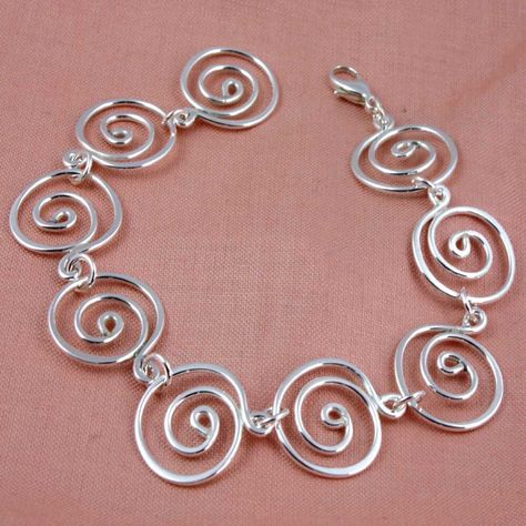 A personal favorite from my Etsy shop https://www.etsy.com/listing/119652860/sterling-silver-maxi-swirl-bracelet Swirl Bracelet, Dope Jewelry, Estilo Punk, Handmade Wire Jewelry, Funky Jewelry, Jewelry Lookbook, Bijoux Diy, Jewelry Inspo, Dream Jewelry