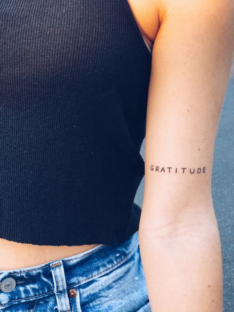 #tattoo #gratitude #tattoodesign #letteringtattoo Tatoos About Gratitude, Gratitude Word Tattoo, Small Gratitude Tattoo, Spiritual Word Tattoos, Gratitude Tattoo Men, Liv Tattoos, Grateful Tattoos For Women, Gratitude Tattoo Ideas, Gratitude Tattoos