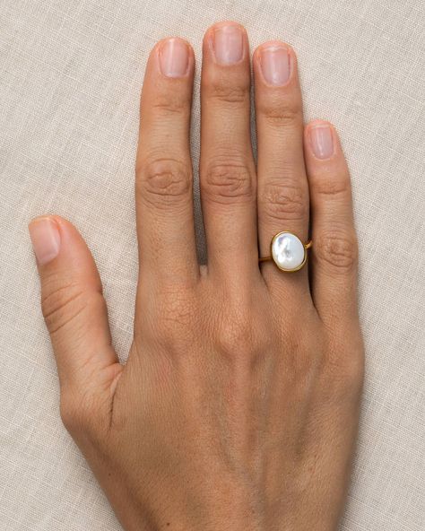 Mother of pearl is said to spark inspiration and intuition, and you’ll get a big dose of both with this statement ring. For a subtler spark, check out our Janne Ring. Gold Mother Of Pearl Ring, Mother Of Pearl Rings, Big Pearl Ring, Pearl Wedding Ring, Natural Pearl Ring, Traditional Engagement, Mother Of Pearl Ring, Random Aesthetics, Pearl Rings