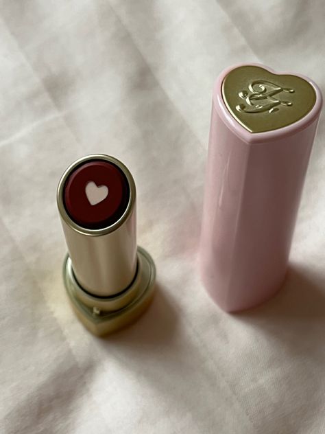 Lipstick Tube Aesthetic, Too Faced Heart Lipstick, Two Faced Makeup Aesthetic, Too Faced Makeup Aesthetic, Lipstick Kisses On Face, Pink Lipstick Aesthetic, Coquette Makeup Products, Too Faced Aesthetic, Vintage Makeup Products